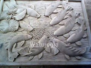 Ukiran Motif Ikan dan Tanaman