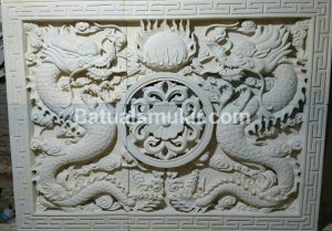 Relief Batu Putih Motif Naga