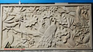 Ukiran dinding ruang tamu dari batu alam berbagai motif elegan